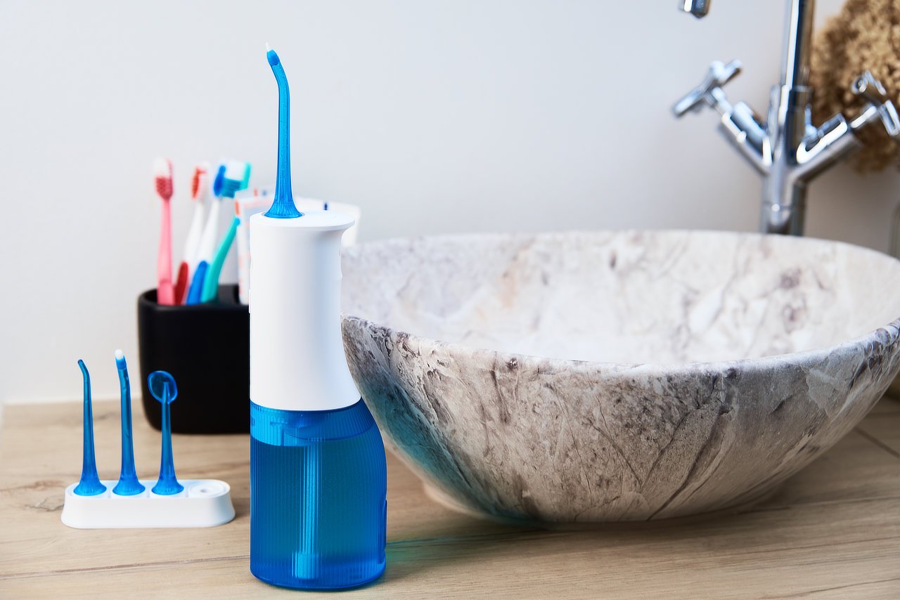 Water Pik (water flosser) have their unique advantages when used for Dental Implant Care